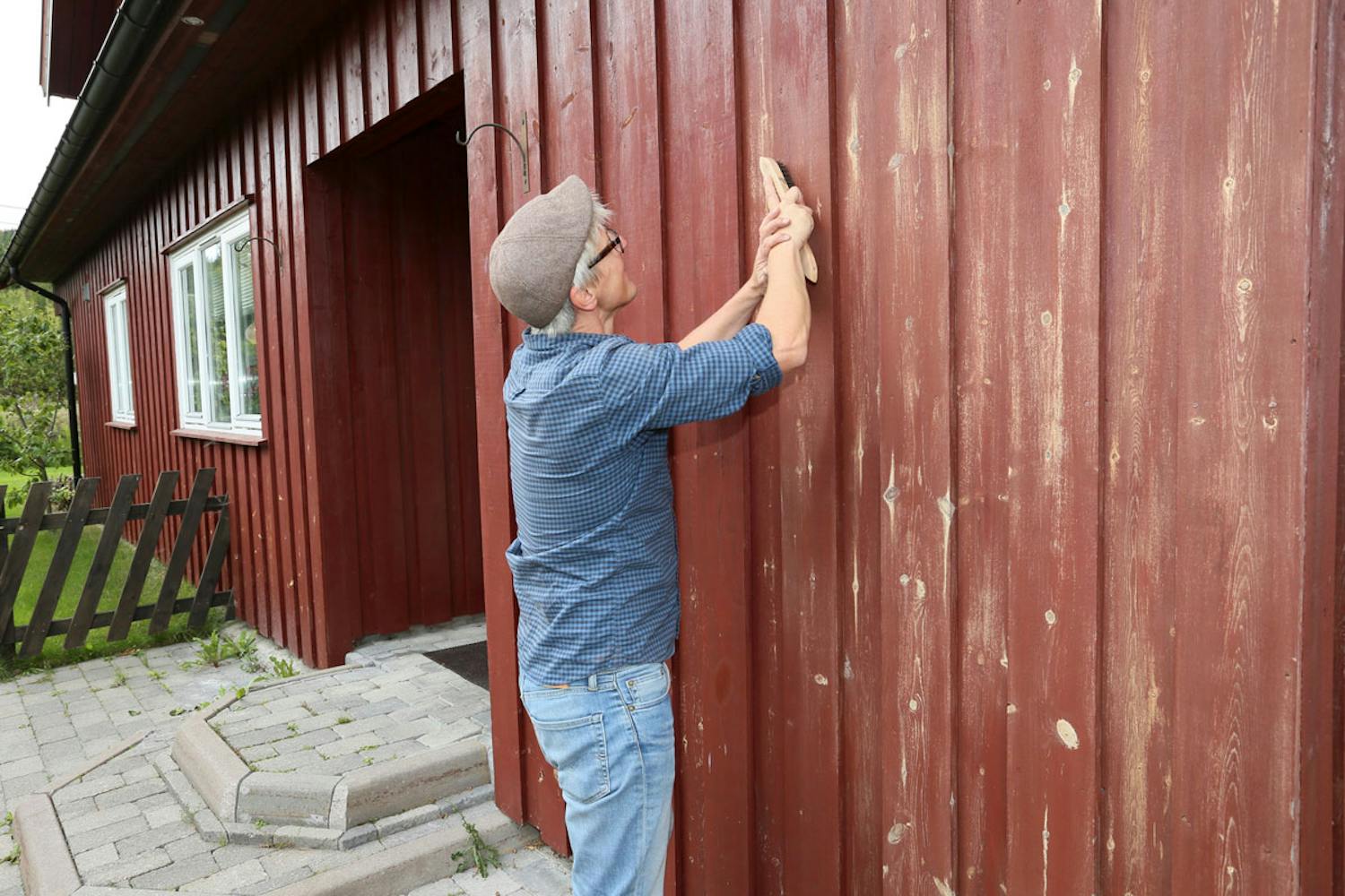 Talon pesu painepesurilla Talon ulkoseinän pesu